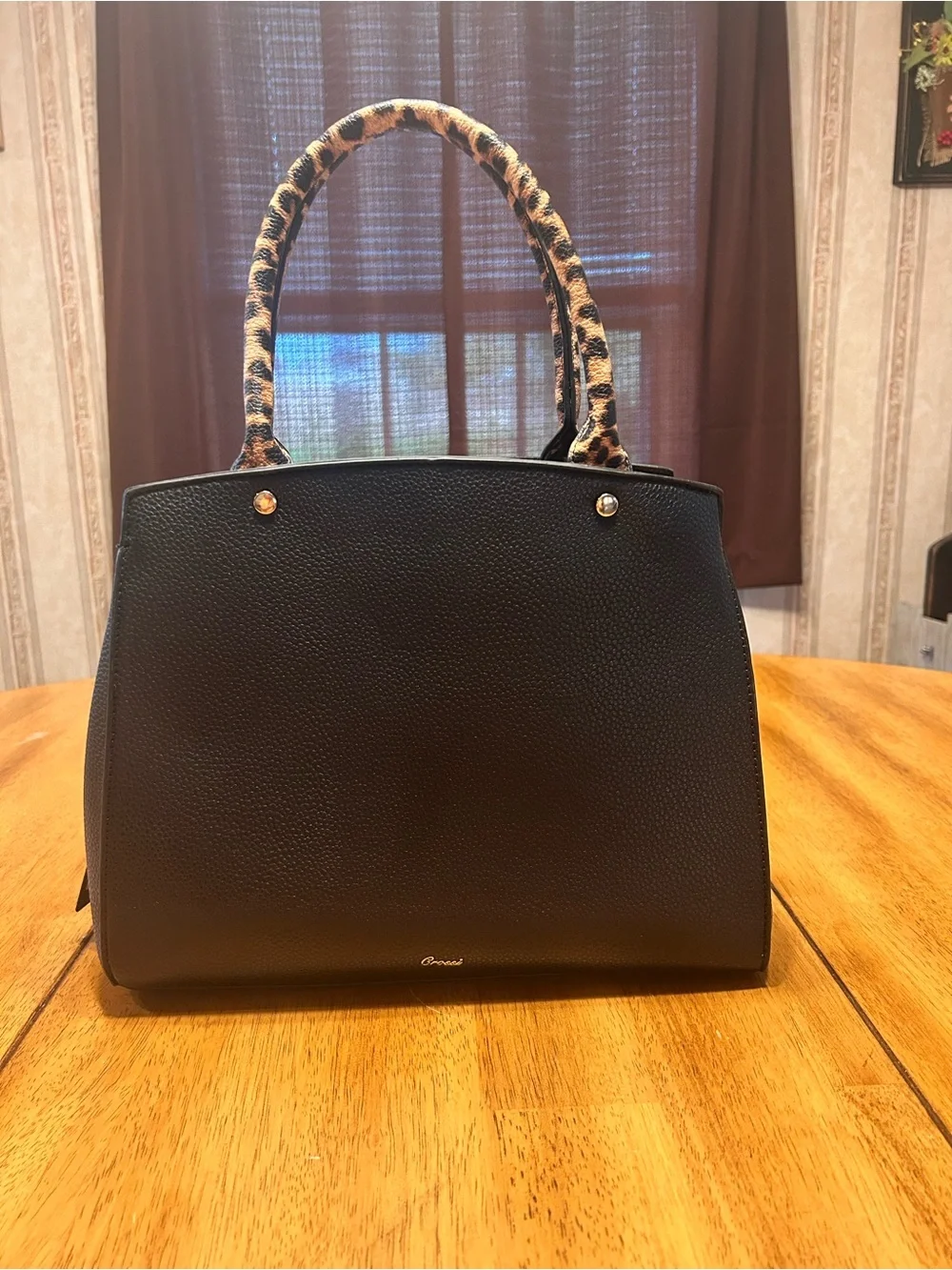 Crossi Chic Black Satchel with Leopard Bow Accent